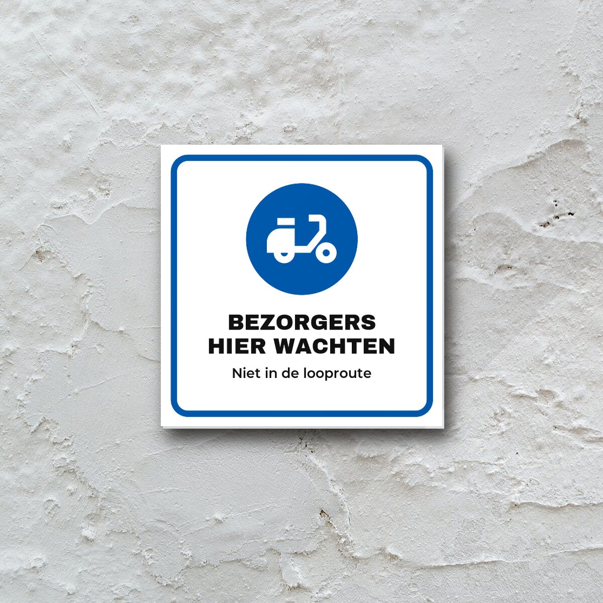 Bordje Bezorgers hier wachten aan de muur