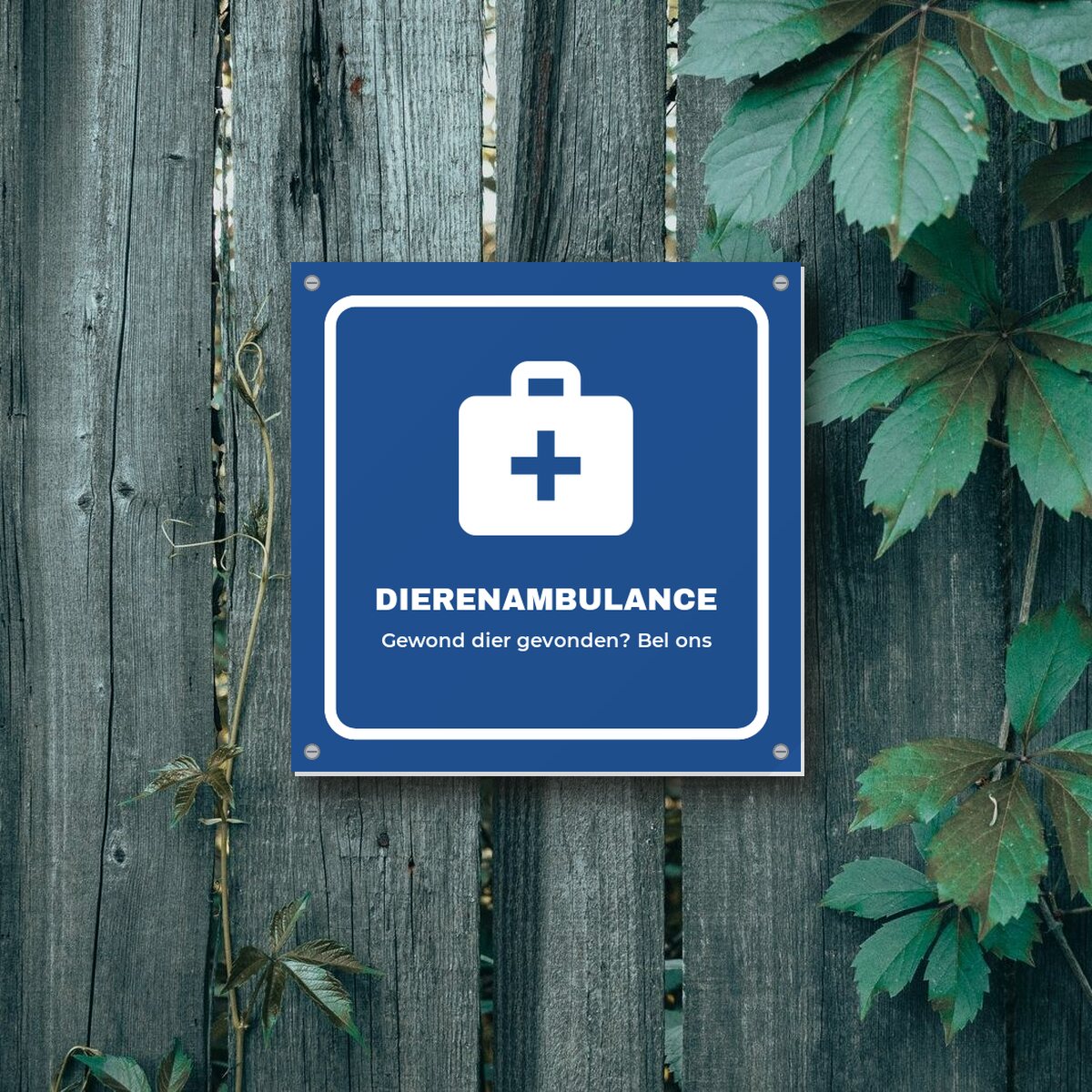 Bordje Dierenambulance aan de muur