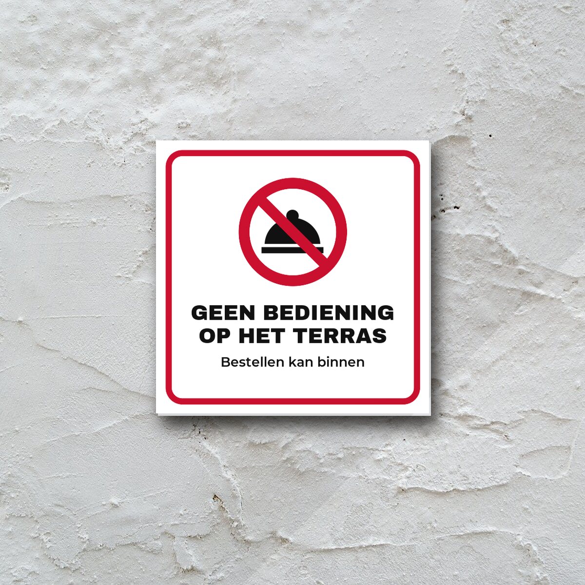 Bordje Geen bediening op het terras aan de muur