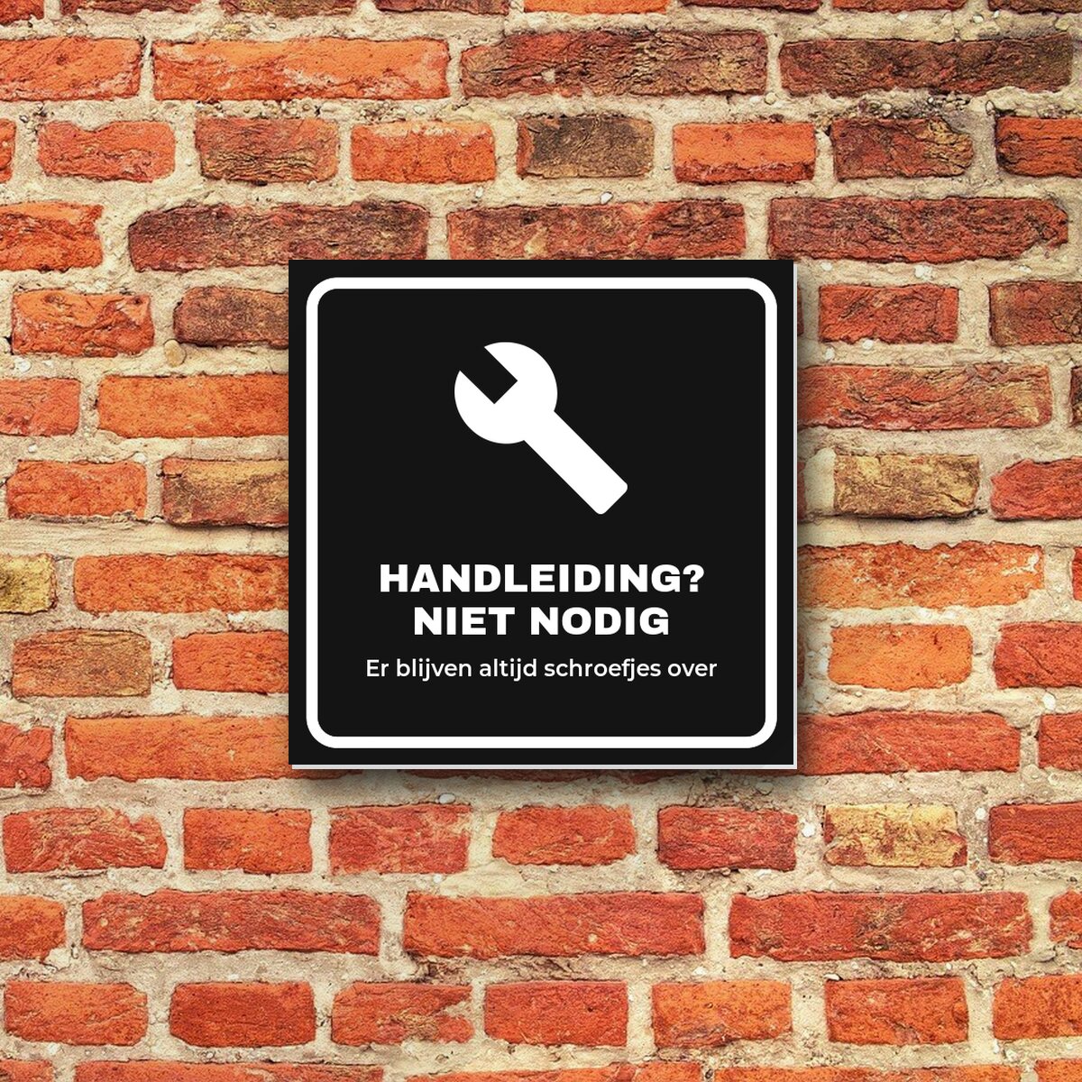 Bordje Handleiding niet nodig aan de muur