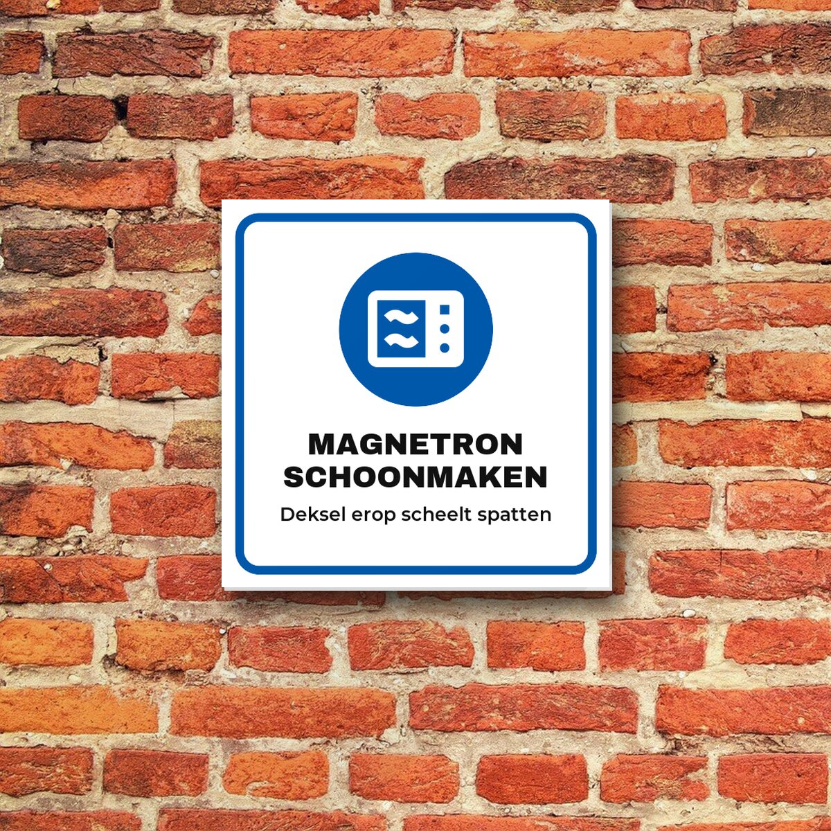 Bordje Magnetron schoonmaken aan de muur