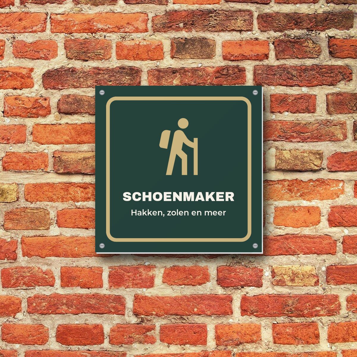 Bordje Schoenmaker aan de muur