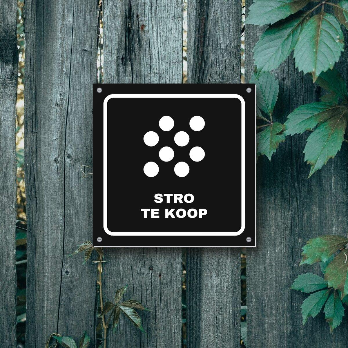 Bordje Stro te koop aan de muur