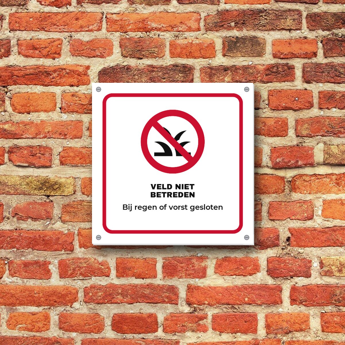 Bordje Veld niet betreden aan de muur