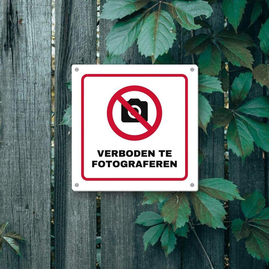 Bordje Verboden te fotograferen aan de muur